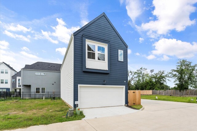 8302 Springwood Canyon Ln, Houston, TX 77055 - view of home's exterior featuring an attached garage and concrete driveway