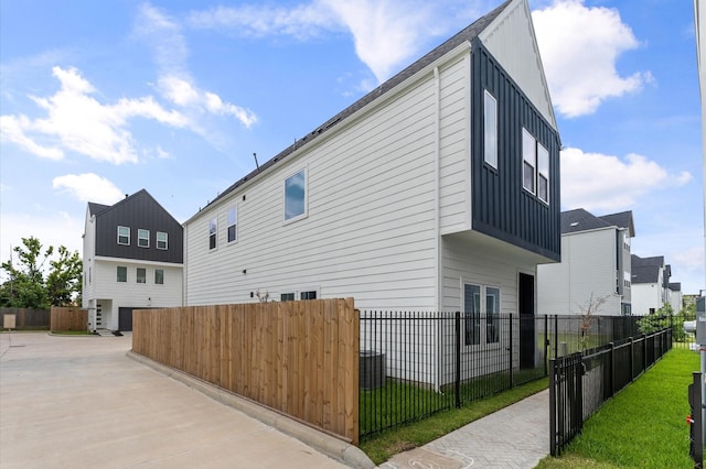 8302 Springwood Canyon Ln, Houston, TX 77055 - view of side of property featuring board and batten siding