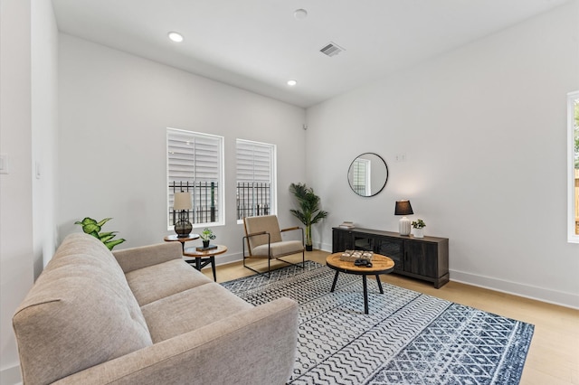 8302 Springwood Canyon Ln, Houston, TX 77055 - living room featuring light wood-style floors, healthy amount of natural light, and recessed lighting