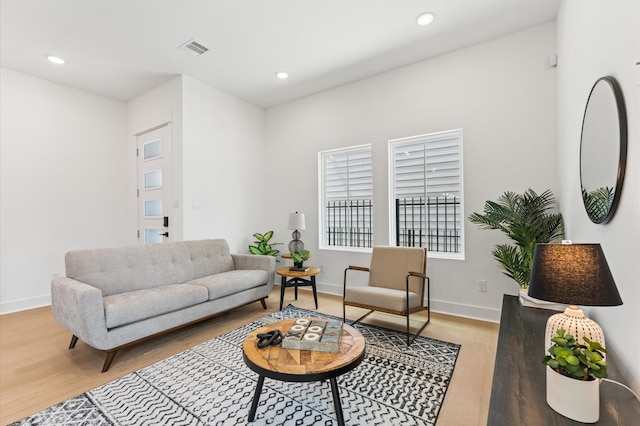 8302 Springwood Canyon Ln, Houston, TX 77055 - living room featuring light wood-style flooring and recessed lighting
