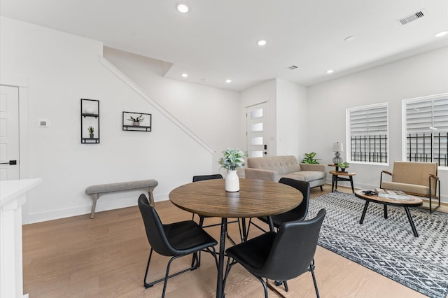 8302 Springwood Canyon Ln, Houston, TX 77055 - dining room featuring light wood-style floors, recessed lighting, and healthy amount of natural light