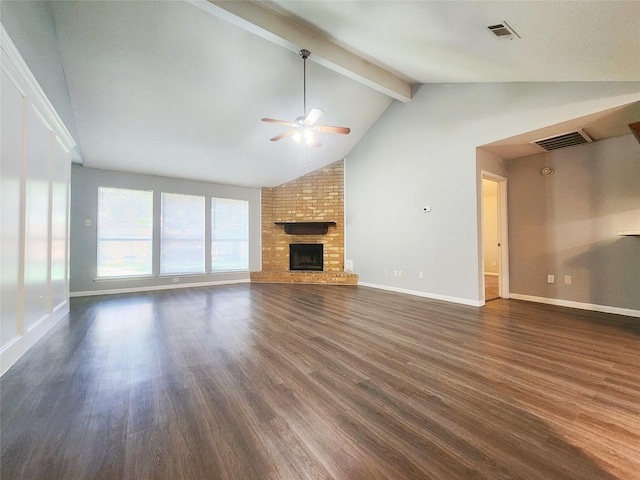 15006 Yorktown Colony Dr, Houston, TX 77084 - unfurnished living room featuring ceiling fan, dark wood finished floors, and a fireplace