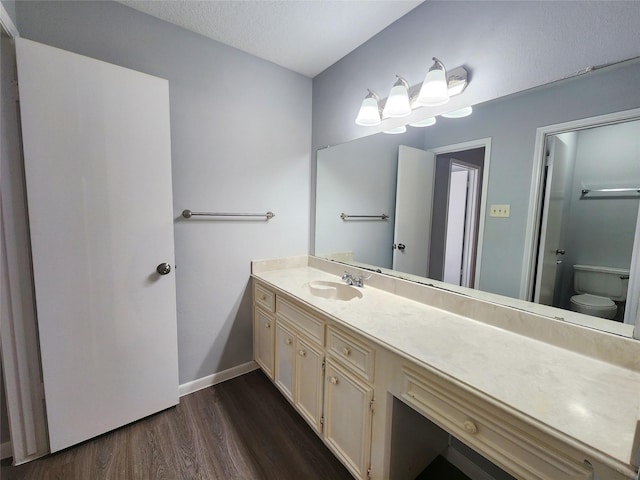 15006 Yorktown Colony Dr, Houston, TX 77084 - bathroom with wood finished floors and vanity