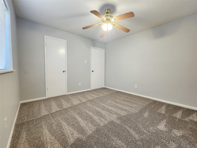 15006 Yorktown Colony Dr, Houston, TX 77084 - unfurnished bedroom with carpet and ceiling fan