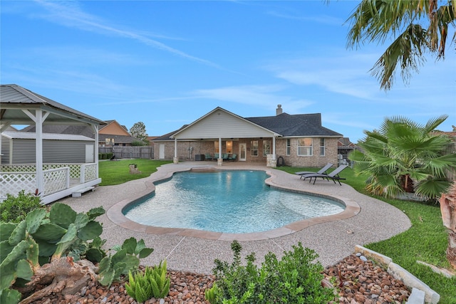 9826 Palm Dr, Mont Belvieu, TX 77523 - view of pool featuring a patio
