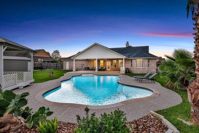 9826 Palm Dr, Mont Belvieu, TX 77523 - view of swimming pool with a patio