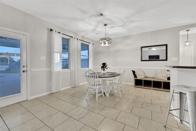 9826 Palm Dr, Mont Belvieu, TX 77523 - dining room featuring light tile patterned floors
