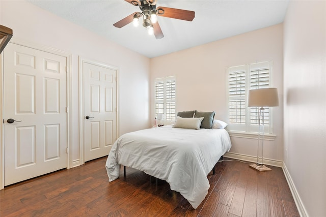 904 Pine Hollow Dr, Friendswood, TX 77546 - bedroom featuring dark wood-style floors and ceiling fan