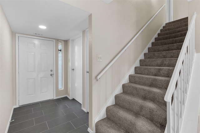 14911 Wunderlich Dr Unit 613, Houston, TX 77069 - entryway featuring stairway and dark tile patterned floors