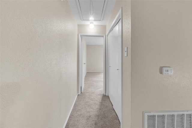 14911 Wunderlich Dr Unit 613, Houston, TX 77069 - corridor with carpet flooring, attic access, and a textured wall