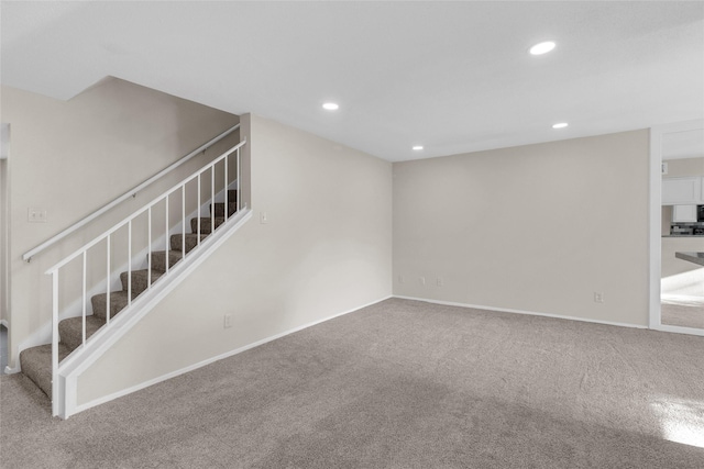 14911 Wunderlich Dr Unit 613, Houston, TX 77069 - basement with carpet flooring, recessed lighting, and stairway