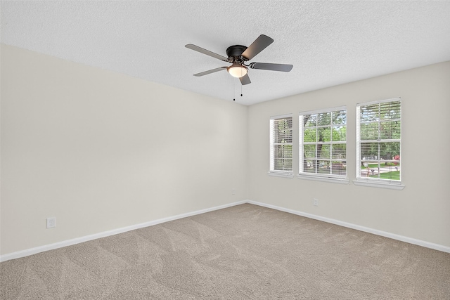 19502 Enchanted Oaks Dr, Spring, TX 77388 - unfurnished room featuring carpet floors, a ceiling fan, and a textured ceiling