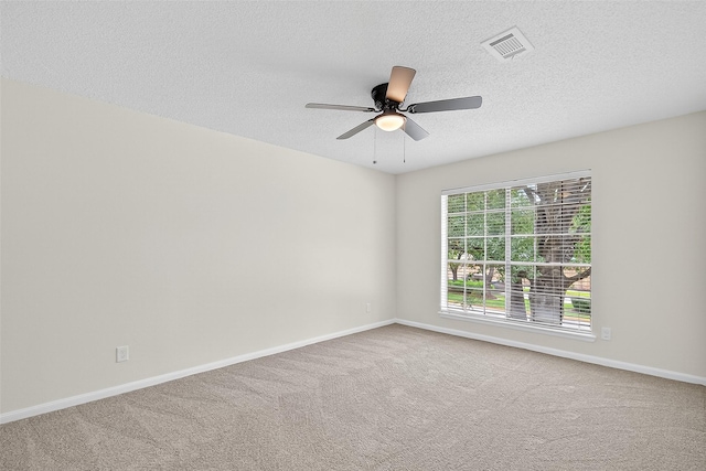 19502 Enchanted Oaks Dr, Spring, TX 77388 - carpeted empty room featuring a ceiling fan and a textured ceiling