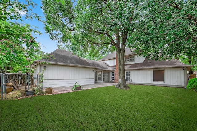 19502 Enchanted Oaks Dr, Spring, TX 77388 - back of house featuring a patio area and roof with shingles