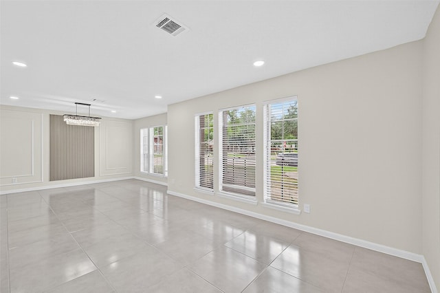 19502 Enchanted Oaks Dr, Spring, TX 77388 - empty room with light tile patterned flooring and recessed lighting
