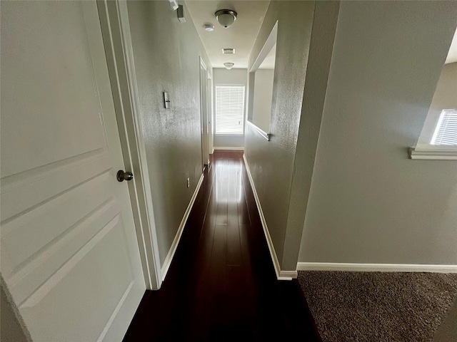 8303 Gros Ventre Ln, Houston, TX 77095 - corridor featuring baseboards and dark wood-style floors