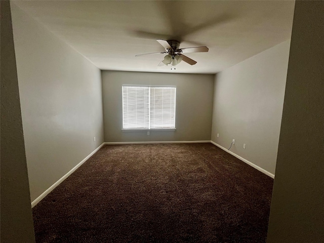 8303 Gros Ventre Ln, Houston, TX 77095 - spare room with dark colored carpet and a ceiling fan
