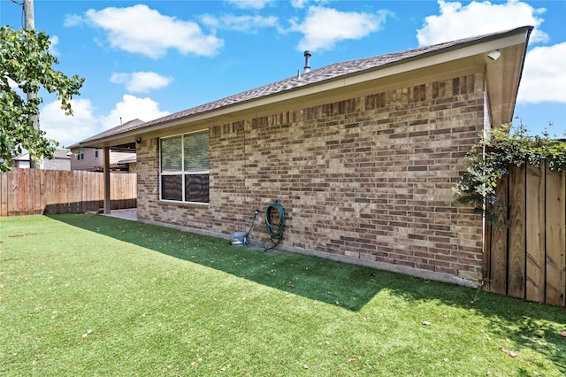 23307 W Pine Ivy Ln, Tomball, TX 77375 - view of side of home featuring brick siding