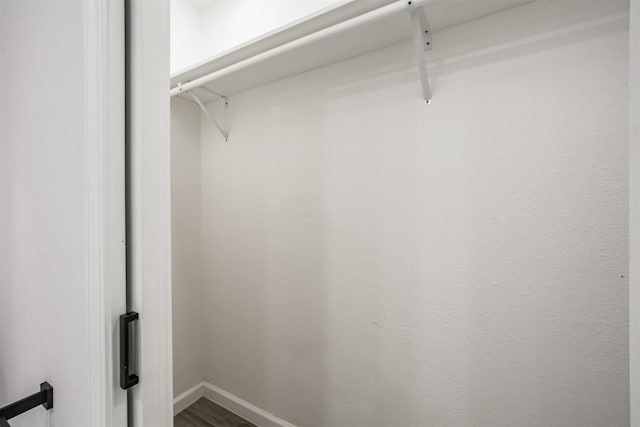 4330 Heite St, Houston, TX 77022 - spacious closet featuring dark wood-type flooring