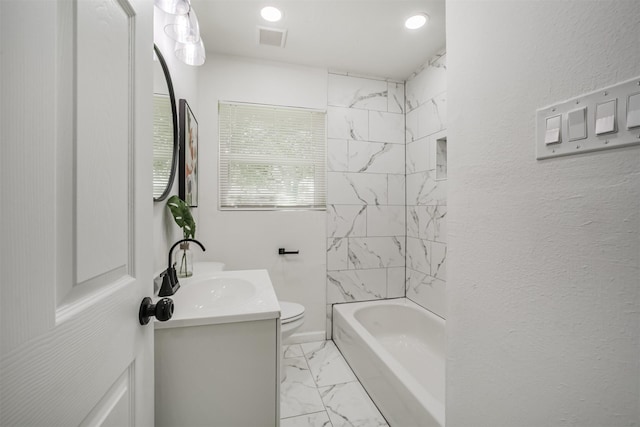 4330 Heite St, Houston, TX 77022 - full bath with vanity, marble look tile flooring, and shower / washtub combination