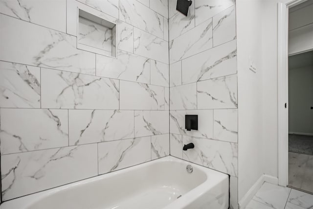 4330 Heite St, Houston, TX 77022 - full bath featuring marble finish flooring and bathing tub / shower combination