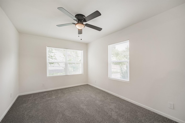4330 Heite St, Houston, TX 77022 - carpeted empty room with baseboards and a ceiling fan