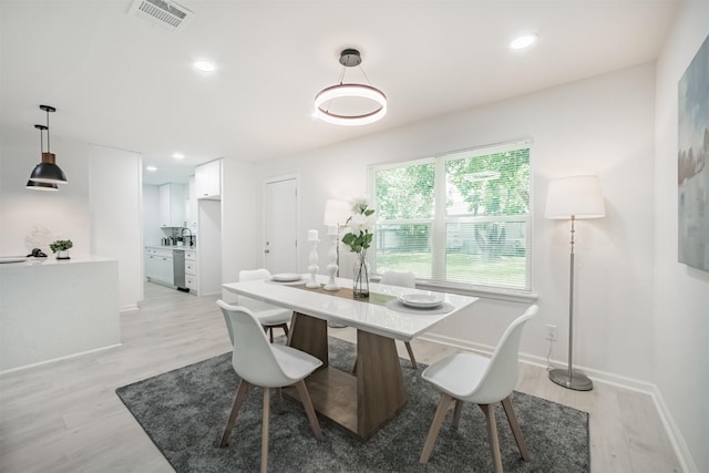 4330 Heite St, Houston, TX 77022 - dining area with light wood finished floors and recessed lighting