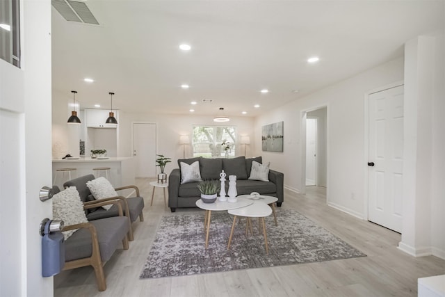 4330 Heite St, Houston, TX 77022 - living room with light wood-style floors and recessed lighting