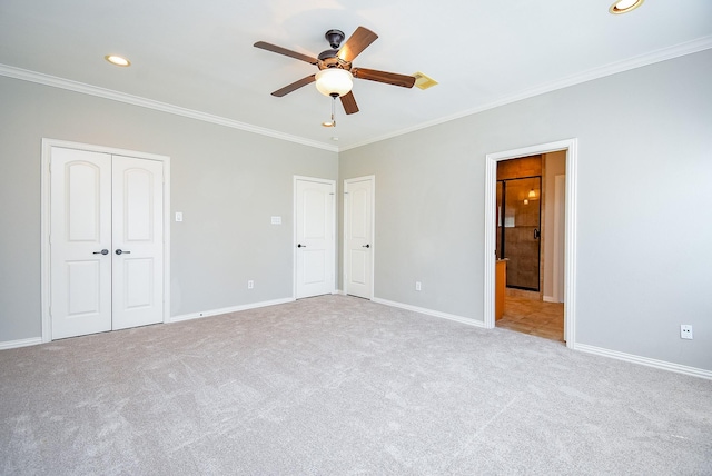 5615 Winsome Ln Unit C, Houston, TX 77057 - unfurnished bedroom with ornamental molding, carpet flooring, multiple closets, recessed lighting, and ensuite bath