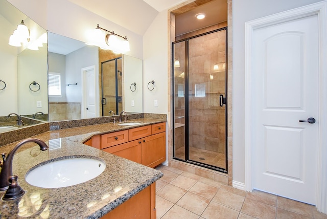 5615 Winsome Ln Unit C, Houston, TX 77057 - bathroom with two vanities, a stall shower, and tile patterned floors
