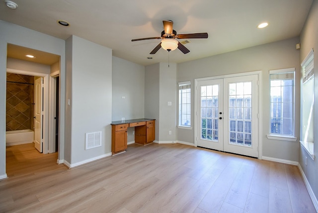 5615 Winsome Ln Unit C, Houston, TX 77057 - unfurnished living room with french doors, light wood-style flooring, a ceiling fan, and recessed lighting