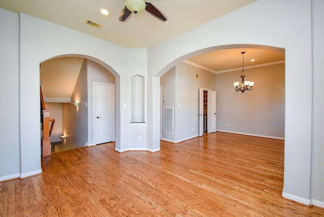 5615 Winsome Ln Unit C, Houston, TX 77057 - empty room featuring ceiling fan, light wood-style flooring, a chandelier, crown molding, and recessed lighting