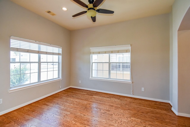 5615 Winsome Ln Unit C, Houston, TX 77057 - unfurnished room with wood finished floors, ceiling fan, arched walkways, and recessed lighting