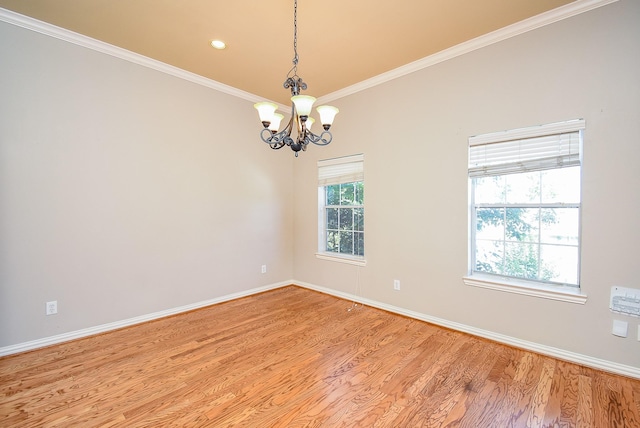 5615 Winsome Ln Unit C, Houston, TX 77057 - spare room featuring a chandelier, light wood finished floors, crown molding, and recessed lighting