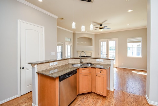 5615 Winsome Ln Unit C, Houston, TX 77057 - kitchen with dishwasher, light wood-style flooring, stone counters, decorative backsplash, and ornamental molding