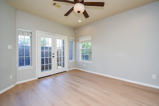 5615 Winsome Ln Unit C, Houston, TX 77057 - empty room with french doors, light wood-style floors, a ceiling fan, and recessed lighting