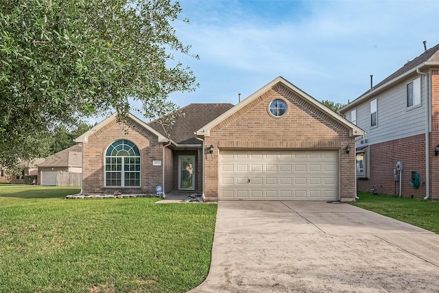 30606 S Sulphur Creek Dr, Magnolia, TX 77355 - traditional-style home featuring brick siding, a front lawn, an attached garage, and concrete driveway