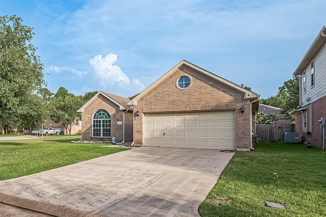 30606 S Sulphur Creek Dr, Magnolia, TX 77355 - view of front of home with brick siding, driveway, and a garage