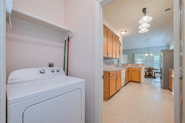 30606 S Sulphur Creek Dr, Magnolia, TX 77355 - washroom with washer / clothes dryer and a sink
