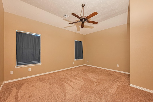 30606 S Sulphur Creek Dr, Magnolia, TX 77355 - empty room featuring carpet, ceiling fan, and a textured ceiling
