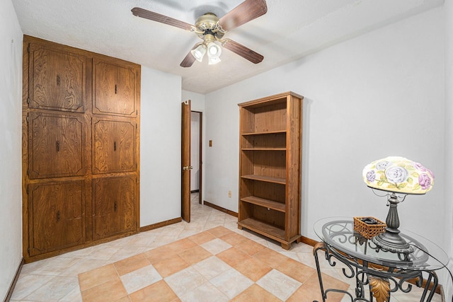 2505 Mary Ave, Pearland, TX 77581 - home office with ceiling fan and light tile patterned floors