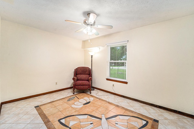 2505 Mary Ave, Pearland, TX 77581 - unfurnished room with light tile patterned floors, a ceiling fan, and a textured ceiling