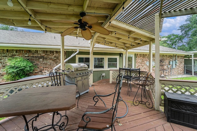 2505 Mary Ave, Pearland, TX 77581 - wooden deck with outdoor dining area, grilling area, and a ceiling fan