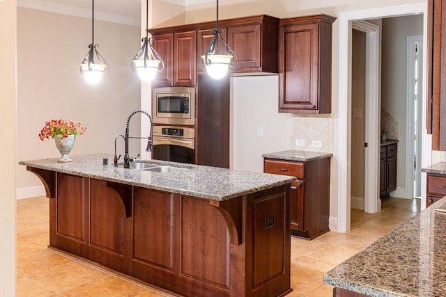 2715 Joshua Tree Ln, Manvel, TX 77578 - kitchen with stainless steel appliances, a breakfast bar, decorative backsplash, light stone counters, and crown molding