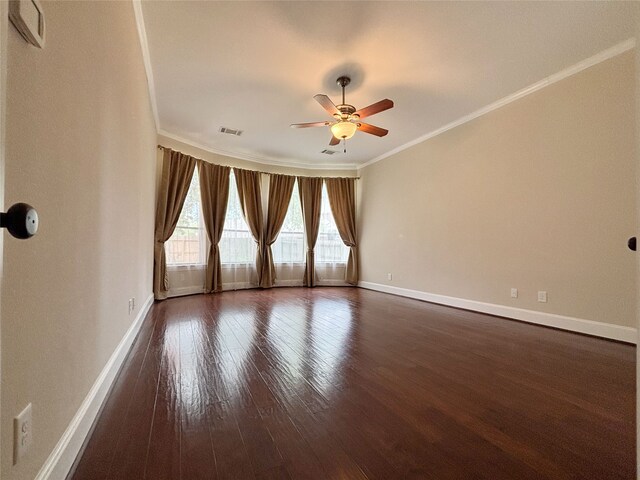 2715 Joshua Tree Ln, Manvel, TX 77578 - empty room featuring a ceiling fan, ornamental molding, and dark wood-type flooring