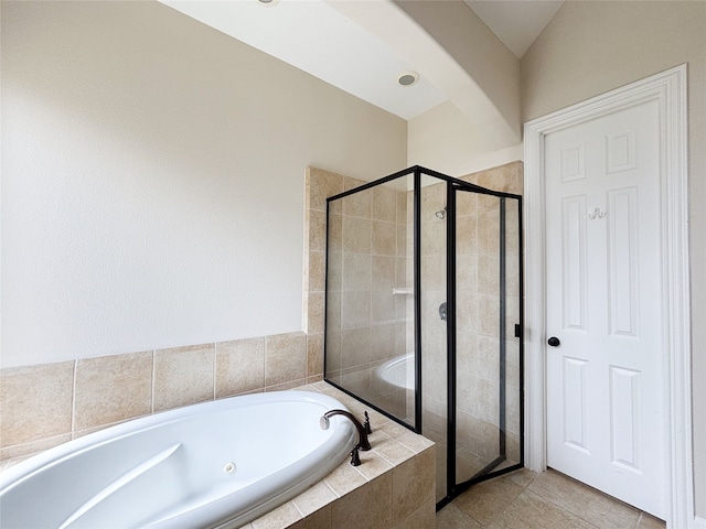 2715 Joshua Tree Ln, Manvel, TX 77578 - bathroom featuring a whirlpool tub, a shower stall, and tile patterned floors