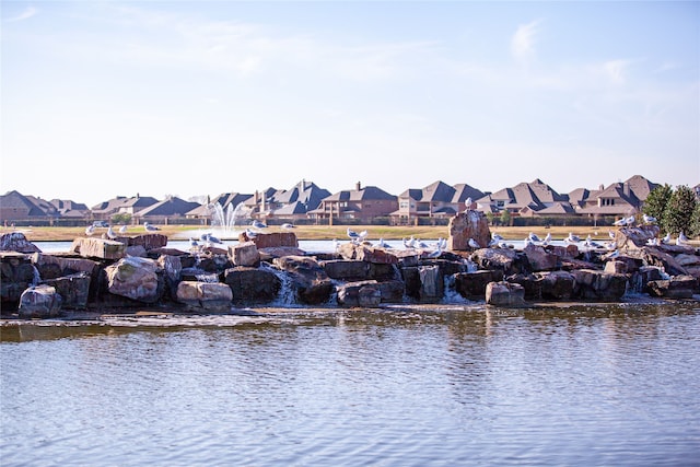2715 Joshua Tree Ln, Manvel, TX 77578 - water view featuring nearby suburban area