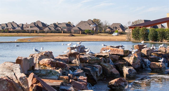 2715 Joshua Tree Ln, Manvel, TX 77578 - water view featuring nearby suburban area