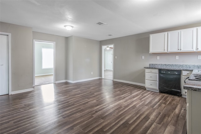 626 W 6th St, Freeport, TX 77541 - kitchen featuring dishwasher, dark wood-style flooring, white cabinets, and light stone counters