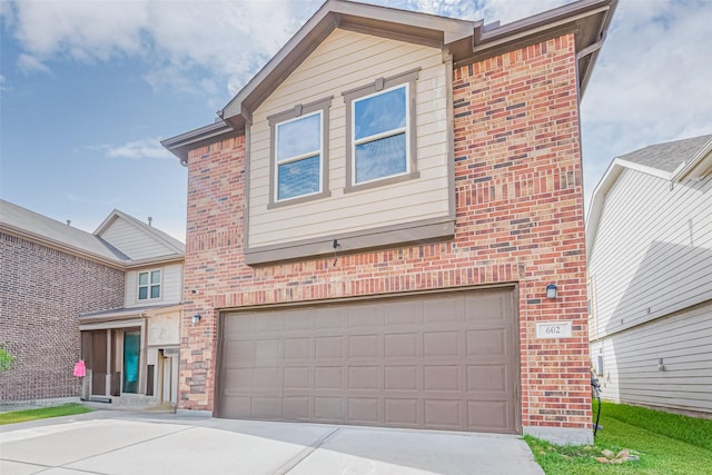 602 Willow Briar Dr, Houston, TX 77090 - view of front of home featuring brick siding, concrete driveway, and a garage